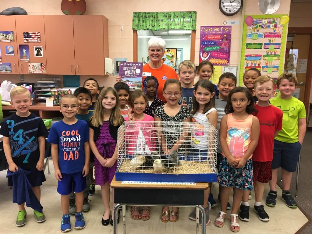 Susan Hendry reading to a class for Ag Literacy Day. Susan was named Florida Farm Bureau's 2016 Volunteer Communicator of the Year. 